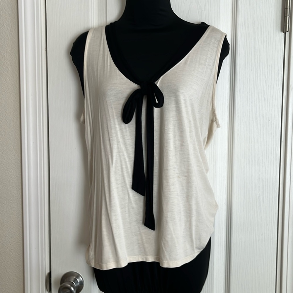 Merona sleeveless top. Cream with place tie and around the neck